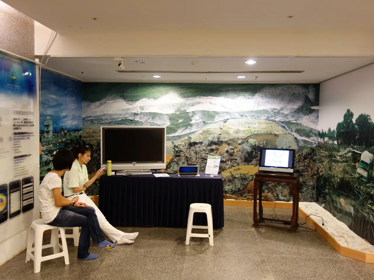 This picture is clicked the inside the room. On the left side of the picture, we see two women...