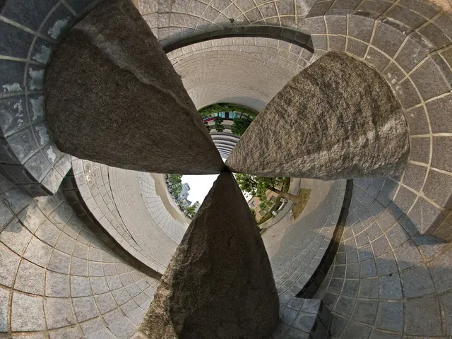 In this image I can see a brutalist architecture , in the middle I can see the sky , tree,...