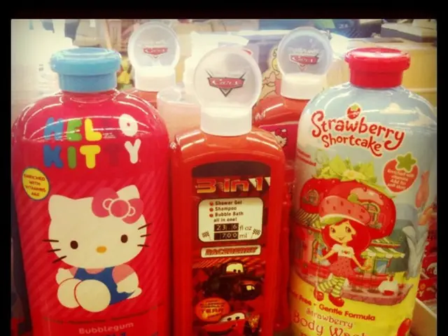 In this image we can see bottles on a platform. In the background we can see objects.