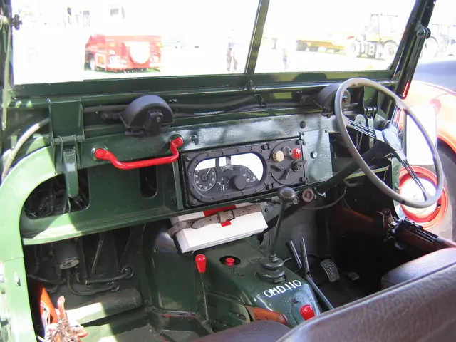 This picture is captured from inside of a vehicle as we can see there is a steering on the right...