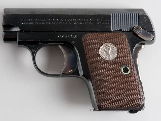 It is a gun in black and brown colors.